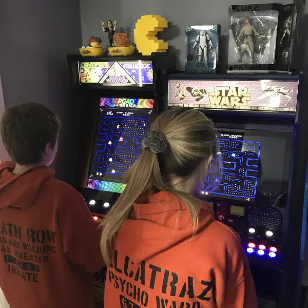 My Kids playing in a Pac-Man arcade competition at home.